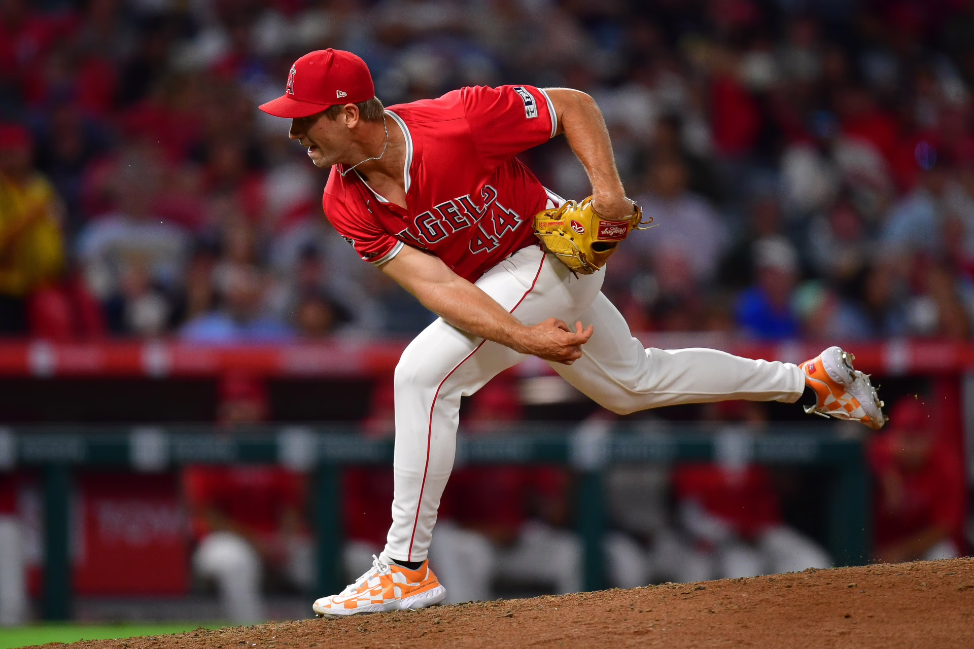 August 16, 2024; Anaheim, California, USA; Los Angeles Angels pitcher Ben Joyce (44) throws against the Atlanta Braves during the eighth inning at Angel Stadium. Mandatory Credit: Gary A. Vasquez-Imagn Images