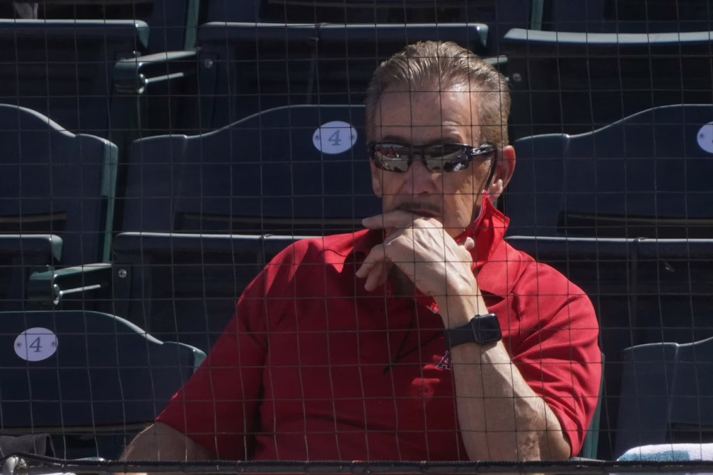 Los Angeles Angels owner Arte Moreno watches game action during a spring training game against the San Francisco Giants at Tempe Diablo Stadium.
