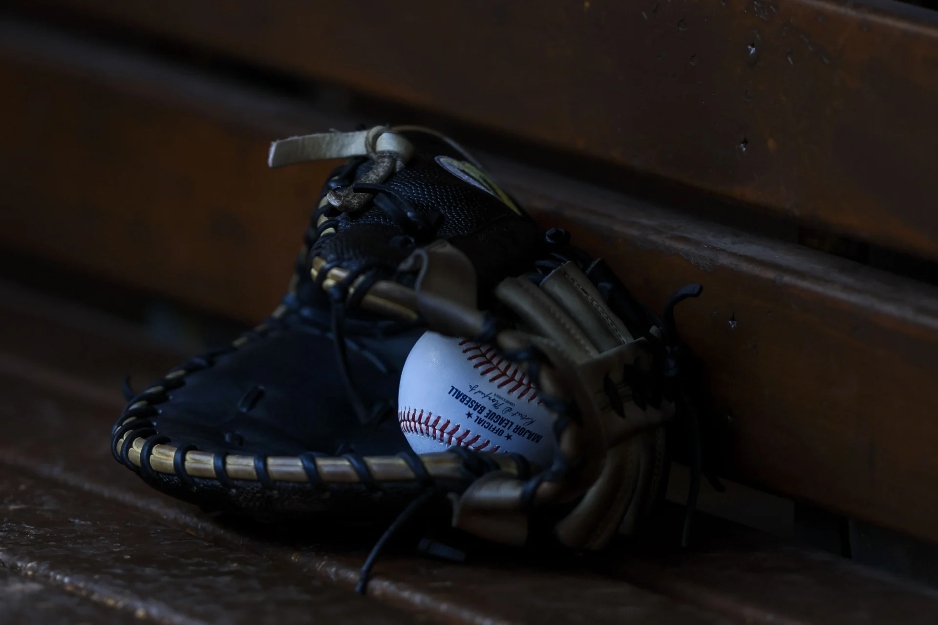 Apr 26, 2026; Cincinnati, Ohio, USA; A general view of a baseball in a glove in the Detroit Tigers dugout during the fourth inning in the game against the Cincinnati Reds at Great American Ball Park. Mandatory Credit: Katie Stratman-Imagn Images