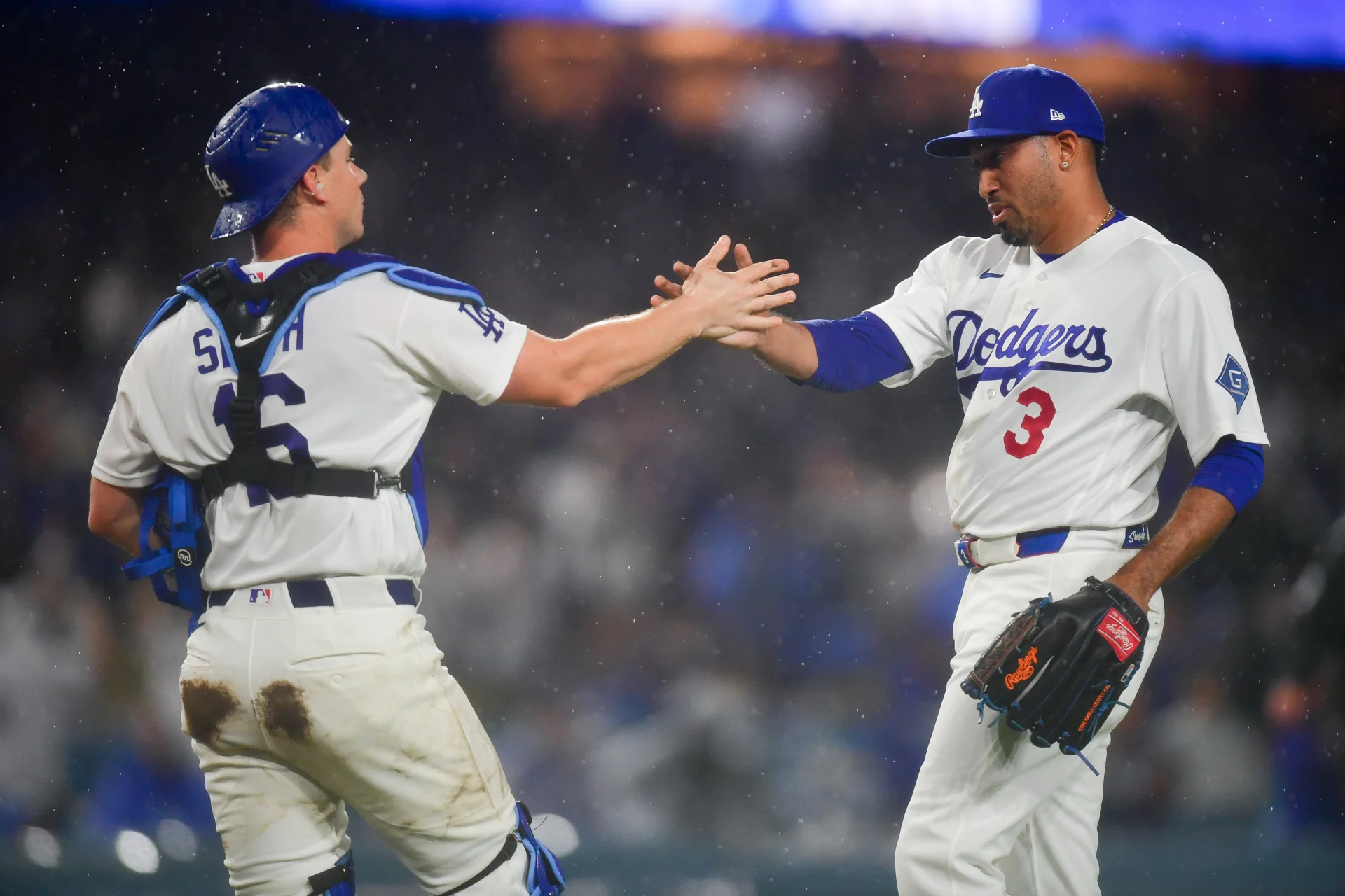 Mar 31, 2026; Los Angeles, California, USA; Los Angeles Dodgers catcher Will Smith (16) and pitcher Edwin Diaz (3) celebrate the victory against the Cleveland Guardians at Dodger Stadium. Mandatory Credit: Gary A. Vasquez-Imagn Images