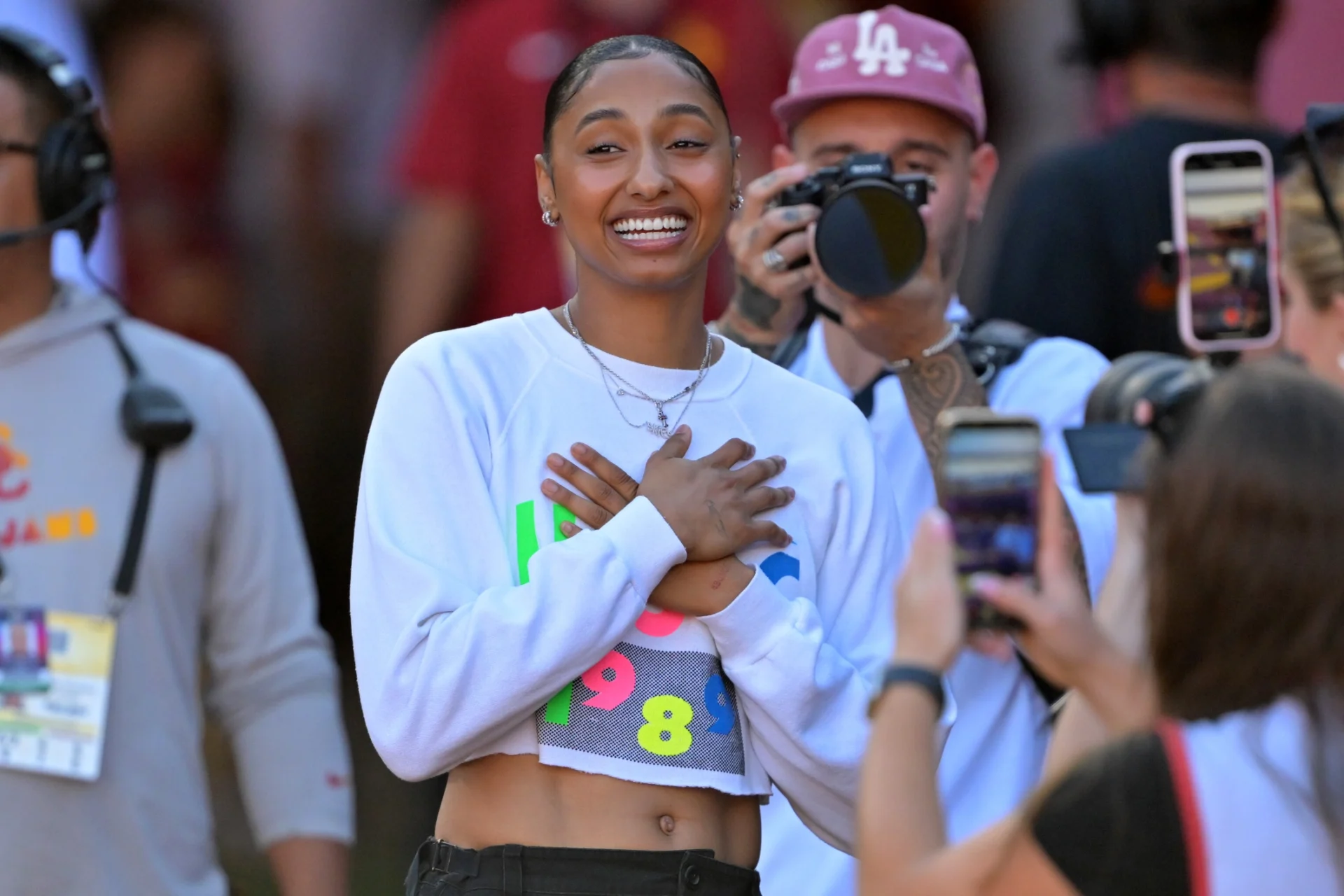 USC Trojans basketball player JuJu Watkins was on hand as she was named the tunnel captain the the game against the Michigan Wolverines at United Airlines Field at the Los Angeles Memorial Coliseum.