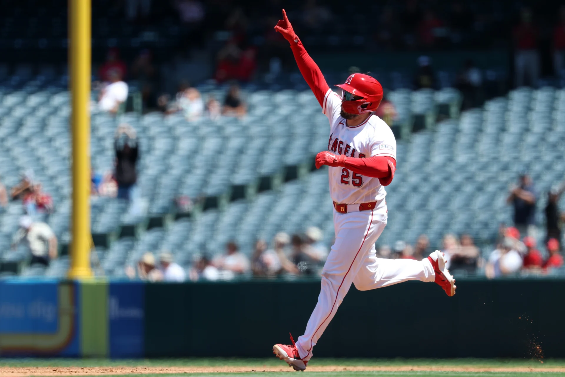 Los Angeles Angels catcher Travis D'Arnaud (25) reacts after hitting a three-run home run during the second inning against the Chicago White Sox at Angel Stadium.